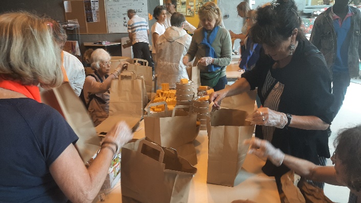 Préparation du repas des migrants